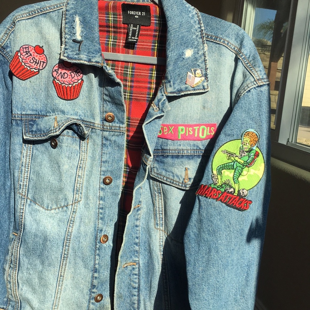 Jean jacket with red plaid inner lining. Patches (Bought separately and added)